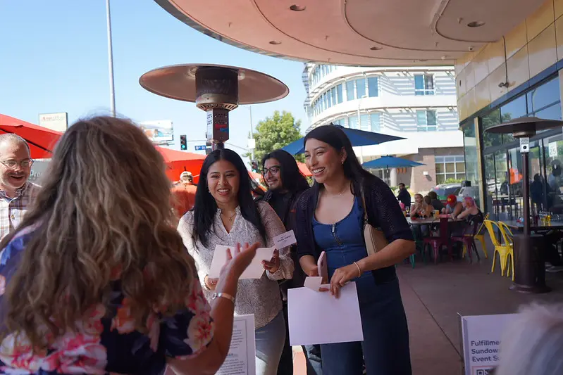 Volunteers engaging with students